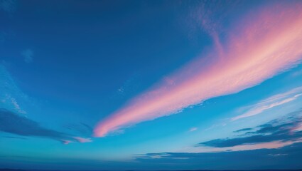 Wall Mural - Airborne clouds against a blue background