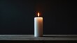 © AbstractAI - White candle aflame on a wooden table against a dark background with empty space