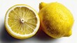 © KASUEMA SALAE - a fresh lemon sliced in half on a white isolated background, zesty and bright design