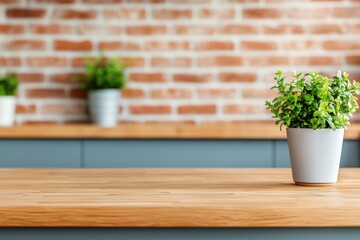 Fototapete - Empty wooden kitchen countertop with potted plant and blurred brick wall background