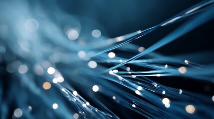 Leinwandbilder - Close-up of luminous blue particles creating intricate streams in a dark space, with a faint code cascading softly in the background for a digital atmosphere
