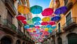 © Preston - street decorated with colored umbrellas poble espanyol de montjuic traditional architectures in barcelona catalonia spain