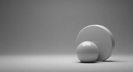 Poster - Two white spheres are placed on a grey background
