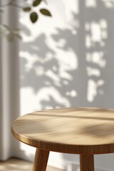 Aufkleber - Minimalist Wood Round Stool with Natural Light and Tree Shadow on Wall Modern Interior Design