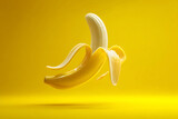 Partially Peeled Yellow Banana on Yellow Background
