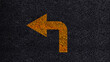 © rawintanpin - Yellow turn left arrow on the road. Road marking, Arrow Direction Choice Left, difficult decision making concept