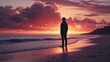 © yarku20 - Silhouette of a young man standing on a beach at sunset, gazing out at the ocean. The sky is ablaze with vibrant orange and purple hues.