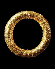 Wall Mural - golden glitter ring on black background creating a luxurious and festive atmosphere with a modern an