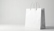 © Jame - Crisp white paper shopping bag, handles visible , element, craft