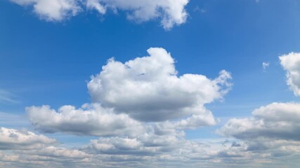 Wall Mural - beautiful blue sky with soft white clouds timelapse for abstract background