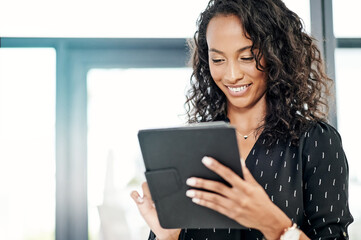 Fototapete - Happy woman, tablet and reading in office for business, creative research and positive feedback in forum. Journalist, tech and typing in agency for email, news resources and information for report
