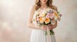 © Matt - Woman holding a bouquet of pink, orange, and white flowers in a white dress