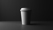 © Aris Suwanmalee - Minimalistic coffee cup on a dark surface, perfect for branding and advertising projects.