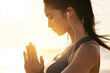 © Moller/peopleimages.com - Beach, meditation and woman with earphones, listening and mindfulness with chanting for peace, music or outdoor. Namaste, nature and streaming mantras on radio, calm and self awareness for person