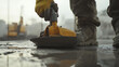 © Mcgui - Construction Worker Using a Circular Saw
