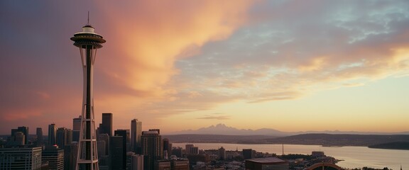 Poster - Futuristic Needle Tower at Sunset with Distant Mountains and Cityscape