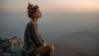 © Anjar Stock - Woman Seated in Peaceful Meditation at Sunrise on Mountain Top Retreat