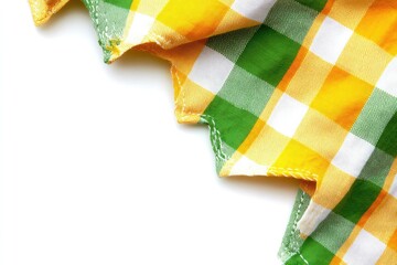 Fototapete - Colorful checkered fabric corner, bright yellow and green squares on white background  Folded fabric displays stitched edges