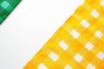 Fototapete - Two checkered tablecloths, green and yellow, cornered on a white background