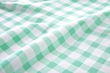 Leinwandbilder - Mint green and white checkered fabric, soft folds  Close-up view of a textile with a repeating pattern