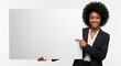 © Khozinul - Smiling African American businesswoman holding a blank white sign, pointing her finger, promoting space for text or advertisement, in a studio setting