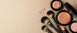 © IBEX.Media - Flat lay of professional makeup products and brushes on a beige background, representing beauty, cosmetics, and skincare branding with elegant simplicity