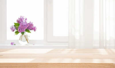 Wall Mural - empty wooden table top in morning light and shadows on blurred curtained window sill background with