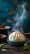 © Mirivox - Steaming bao bun in blue bowl, on dark wood table with cilantro garnish, showcasing culinary artistry and Asian cuisine