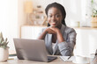 © Prostock-studio - Millennial businesswoman portrait. Young African Ceo Smiling Sitting At Workplace In Modern Office.