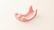 © Premium Illustration - Jaw Filler. Pink dental model with white teeth, close-up of orthodontic study tool, ideal for dental care, education, clinic presentations, clean minimal background, bright lighting, healthcare conce