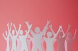 © Imagentive - White Paper Cutout People Celebrating Together on Pink