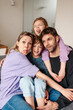 © Melissa Milis Photography/Stocksy - Playful family portrait