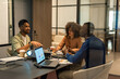© Milles Team/Stocksy - Colleagues brainstorming in meeting room