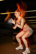© Javier Díez/Stocksy - Intense workout session in a modern gym with dynamic motion