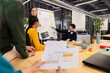 © VICTOR TORRES/Stocksy - Creative team collaborating on design and prototype planning