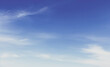 © birulaut - Blue sky with soft white clouds creating a peaceful and airy atmosphere. luxury sky photos for landscape backgrounds and wallpapers. backgrounds.