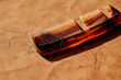 © Juan Moyano/Stocksy - broken comb with some hair