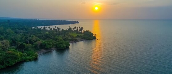 Poster - Tropical Coastline at Sunset with Lush Green Forest and Calm Ocean Water Reflecting the Golden Light