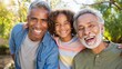 © Creative Amateur  - Generations: grandfather, father, and son smiling together outdoors