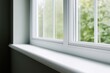 © michnik101 - White plastic window with sill. daylight view from interior with green garden