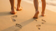 © Rawpixel.com - Footprints bonding beach walk