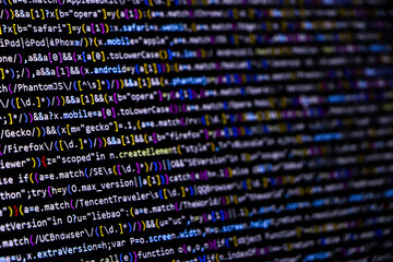 software source code. programming code. programming code on computer screen. developer working on pr