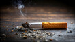 © MinaNasrin - Discarded cigarette butt on floor representing smoking hazard and environmental pollution danger