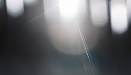 Leinwandbilder - abstract light glare with blurred bokeh and lens flare on dark background for modern web design, branding visuals, or digital print texture graphic


