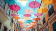 © Lumevia - Colorful umbrellas decorate a charming city street.