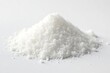 © Kraengkrai - Crystalline sugar granules, pure white background, culinary, dietary, background