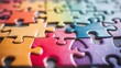 © Indian - Close-up view of colorful puzzle pieces arranged together.