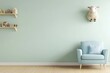 © Designphts - Pastel-toned children's room with a light mint green wall, wooden shelves, toy figurines, a sheep wall decoration, and a light blue armchair