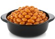 © LUCKY - A black bowl filled to the brim with orange baked beans in a sweet tomato based sauce on a white surface