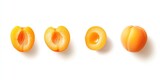 Fresh apricot halves and whole fruit, top view.  Bright yellow-orange fruit halves, revealing juicy interior, displayed against a plain white background